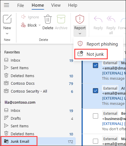 Rapporter-knappen i Outlook på web med Not junk-valget i søppelpost-mappen